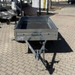 ALFA 12013MN.75L egytengelyes, 2,0x1,25m méretű, 750kg fék nélküli, laprugós mellsőkerekes fix oldalfalas nyitott utánfutó