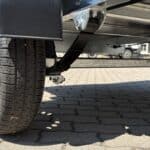 ALFA 12013MN.75L egytengelyes, 2,0x1,25m méretű, 750kg fék nélküli, laprugós mellsőkerekes fix oldalfalas nyitott utánfutó