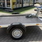 ALFA 12116MP.75 egytengelyes, 2.10×1.60m méretű, 750kg fék nélküli mellsőkerekes uniplatós síkplatós motorszállító és quadszállító utánfutó