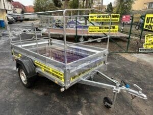 Zaslaw 235SU 2,35x1,32m méretű, 750kg fékezetlen mellsőkerekes fix oldalfalas nyitott utánfutó, használt utánfutó