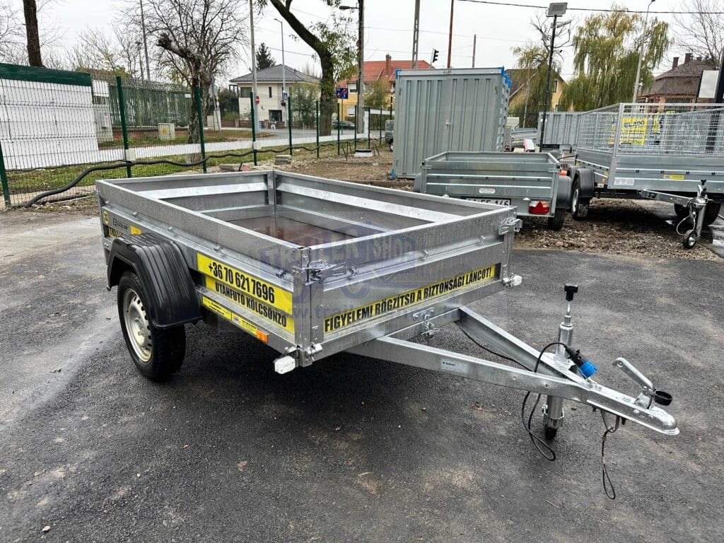 Zaslaw 205SU 2,05x1,22m méretű, 750kg fékezetlen mellsőkerekes fix oldalfalas nyitott utánfutó, használt utánfutó