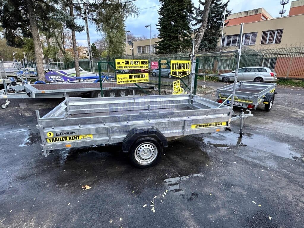 Zaslaw 300SU 3,00×1,47m méretű, 750kg fékezetlen mellsőkerekes fix oldalfalas nyitott utánfutó, használt utánfutó