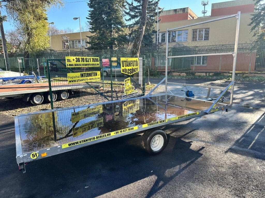 ALFA 14020AP.75 10″ 4,05×2,00m méretű, 1300kg egytengelyes fékezett alsókerekes uniplatós síkplatós utánfutó trailer, tréler, használt utánfutó