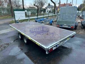 ALFA-T 44020AP.270-ig 10″ kéttengelyes, 4,05×2,0m, 2700kg, fékezett, alsókerekes, síkplatós, uniplatós utánfutó, trailer, tréler és autószállító tréler, használt utánfutó