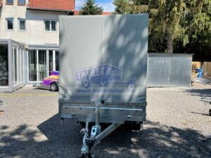 ALFA-T 44020AP.300-ig 13" kéttengelyes, 4,05x2,0m, 3000kg, fékezett, alsókerekes, síkplatós, uniplatós utánfutó, trailer, tréler és autószállító tréler PONYVÁVAL