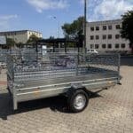 ALFA-B 23015MN.100-ig egytengelyes, 2,94x1,44m méretű, 1000kg fékezett mellsőkerekes fix oldalfalas utánfutó RÁCCSAL