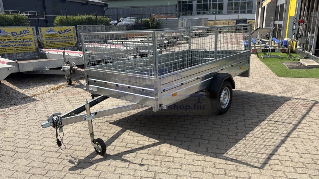 ALFA-B 23015MN.100-ig egytengelyes, 2,94x1,44m méretű, 1000kg fékezett mellsőkerekes fix oldalfalas utánfutó RÁCCSAL