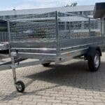 ALFA-B 23015MN.100-ig egytengelyes, 2,94x1,44m méretű, 1000kg fékezett mellsőkerekes fix oldalfalas utánfutó RÁCCSAL