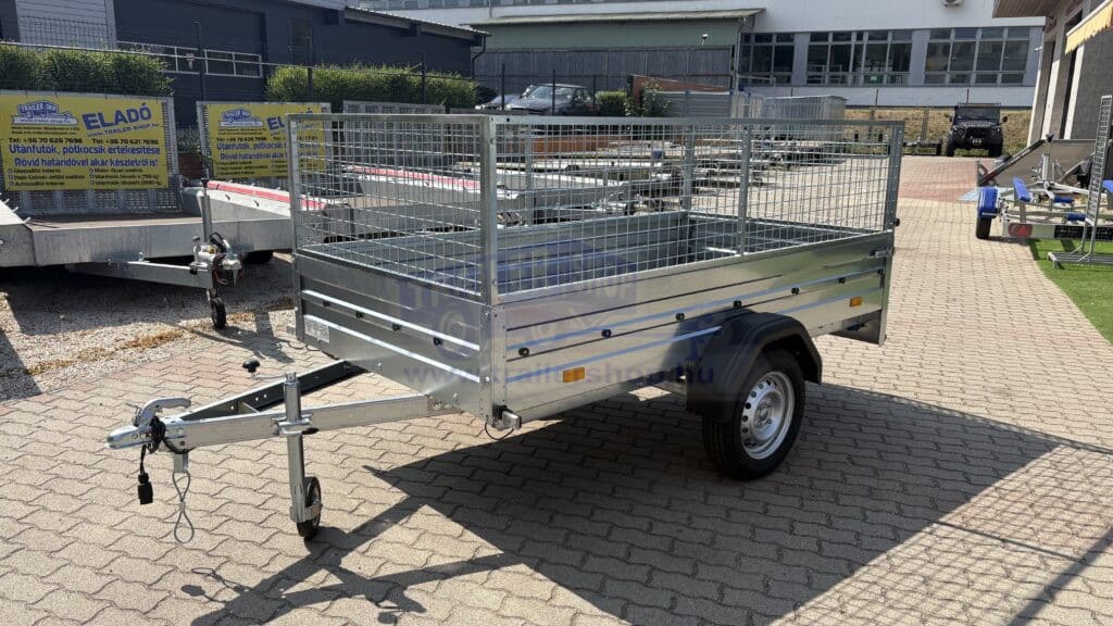 ALFA 12513MN.75 egytengelyes, 2,44x1,25m méretű, 750kg fék nélküli, mellsőkerekes fix oldalfalas nyitott utánfutó RÁCCSAL