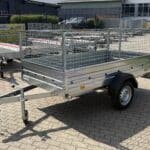 ALFA 12513MN.75 egytengelyes, 2,44x1,25m méretű, 750kg fék nélküli, mellsőkerekes fix oldalfalas nyitott utánfutó RÁCCSAL