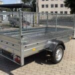 ALFA 12513MN.75 egytengelyes, 2,44x1,25m méretű, 750kg fék nélküli, mellsőkerekes fix oldalfalas nyitott utánfutó RÁCCSAL