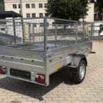 ALFA 12513MN.75 egytengelyes, 2,44x1,25m méretű, 750kg fék nélküli, mellsőkerekes fix oldalfalas nyitott utánfutó RÁCCSAL