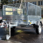 ALFA 12011MN.75 egytengelyes, 2,0x1,08m méretű, 750kg fék nélküli, mellsőkerekes fix oldalfalas nyitott utánfutó RÁCCSAL